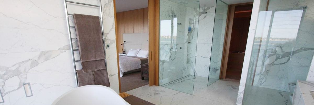 Marble bathroom with a heated towel ladder in a Euroheat hydronic home, Saunders Street, Perth